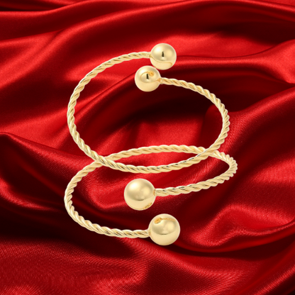 Set of two Belizean Harmony Loops Bangles in 18k gold plating.