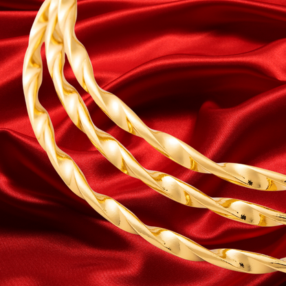 The Mosquito Coast 7 piece twisted Gold Plated Bangle Set